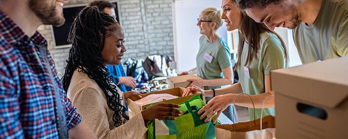 people interact at volunteer event