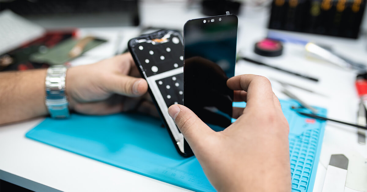 person repairing mobile device